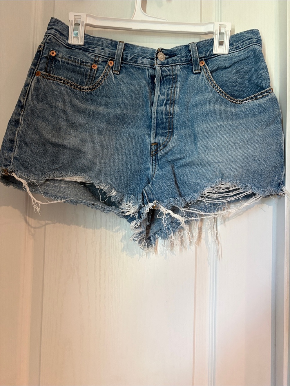 Levi's Light Blue Frayed Denim Cutoff Shorts